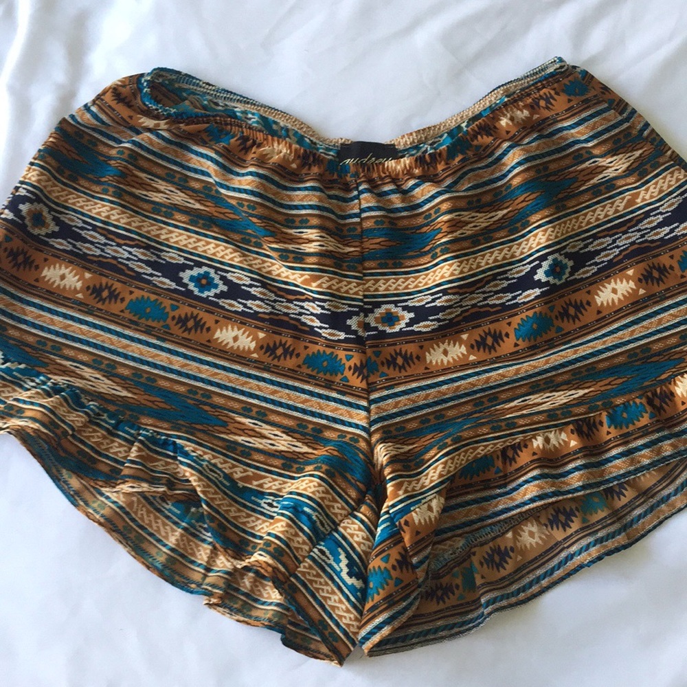 Mini shorts with ruffles, native pattern